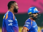 Kieron Pollard in a chat with Rohit Sharma