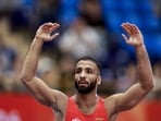 India's Sujeet Kalkal celebrates after winning gold medal in the men's Freestyle 65 kilogram final bout 196 wrestling event in the ongoing Asian Games 2026, in Nagoya, Japan, Friday, Oct. 2, 2026.