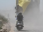 Regular campaigns will be conducted to ensure that roads and roadside pavements are cleaned and washed, while the central verges and trees will be washed by the horticulture department so that dust does not rise. (HT Photo)