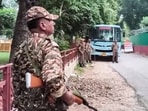 Security personnel stand guard during a raid conducted by Central Bureau of Investigation (CBI) at Punjab Chief Minister Bhagwant Mann’s camp office, in Chandigarh, Tuesday.