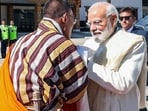 Prime Minister Narendra Modi greets Bhutan's Prime Minister Tshering Tobgay on his arrival , in Thimphu, Bhutan.