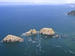 Three Arch Rocks National Wildlife Refuge, the first west of the Mississippi established in 1907, protects 15 acres of vital seabird and Steller sea lion habitats. The refuge remains closed to the public to safeguard its sensitive wildlife populations.