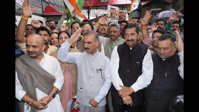 Chief Minister Sukhvinder Singh Sukhu with deputy chief minister Mukesh Agnihotri and Congress workers and leaders during a protest in Shimla on Wednesday. (Deepak Sansta/HT) Chief Minister Sukhvinder Singh Sukhu with deputy chief minister Mukesh Agnihotri and Congress workers and leaders during a protest in Shimla on Wednesday. (Deepak Sansta/HT)