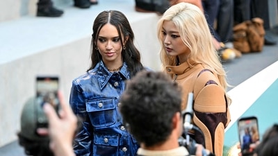 Members of the girl group Katseye, Daniela Avanzini and Yoonchae, pose as they arrive ahead of the Louis Vuitton Women's Spring/Summer 2027 collection. (AFP) Members of the girl group Katseye, Daniela Avanzini and Yoonchae, pose as they arrive ahead of the Louis Vuitton Women's Spring/Summer 2027 collection. (AFP)
