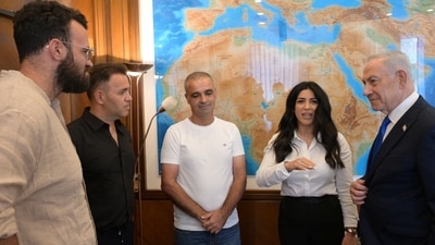 Israeli Prime Minister Benjamin Netanyahu meets with Yaniv Hayoun, Or Fradilov, Dr. Shota Musaev and his wife, Sigalit, who he described as "heroes" in Jerusalem October 1, 2026. (REUTERS)