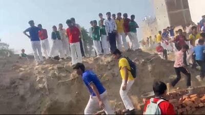 On Wednesday morning, students were playing on the ground when around 20 to 25 workers allegedly arrived and began construction work. School officials said about 200 students accompanied teachers who went towards the site and stopped the work. (HT Photo) On Wednesday morning, students were playing on the ground when around 20 to 25 workers allegedly arrived and began construction work. School officials said about 200 students accompanied teachers who went towards the site and stopped the work. (HT Photo)