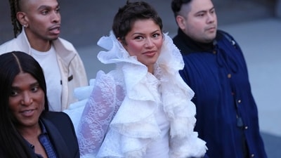Zendaya also attended the Louis Vuitton Womenswear Spring Summer 2027 collection with her stylist, Law Roach. She rewore an LV lace-ruffled top that she had earlier worn to the Odyssey press tour. This time, she styled with jeans and a tank top. (AP Photo/Aurelien Morissard) Zendaya also attended the Louis Vuitton Womenswear Spring Summer 2027 collection with her stylist, Law Roach. She rewore an LV lace-ruffled top that she had earlier worn to the Odyssey press tour. This time, she styled with jeans and a tank top. (AP Photo/Aurelien Morissard)