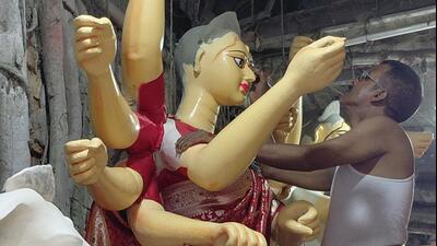 The traditional idols strictly adhere to the scriptural rules regarding the Goddess’ posture, facial expressions, colour, weapons and ten ar The traditional idols strictly adhere to the scriptural rules regarding the Goddess’ posture, facial expressions, colour, weapons and ten ar