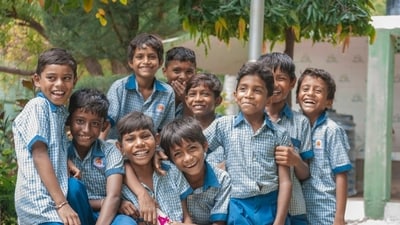 A child who is running a race on a smoggy morning would draw far more pollution, and draw it deeper into the lungs, than a classmate sitting at a desk. (Unsplash/ Representational)