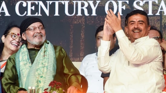 West Bengal Chief Minister Suvendu Adhikari and actor and BJP leader Mithun Chakraborty at a state-level programme celebrating the 100th birth anniversary of Bengali actor Uttam Kumar (or Mahanayak), in Kolkata on Thursday.(ANI)