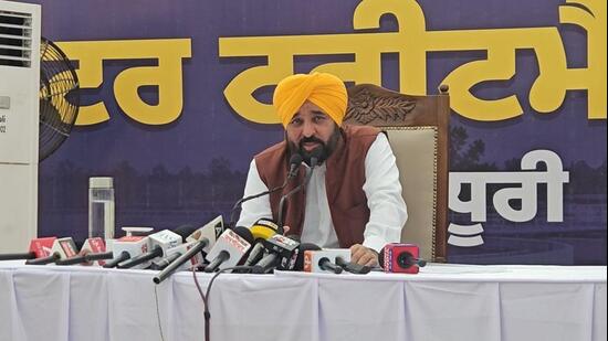 Chief minister Bhagwant Mann addressing the media after laying the foundation stone for a water treatment plant in Dhuri on Wednesday. (HT Photo)