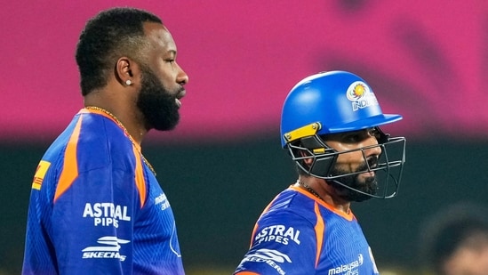Kieron Pollard in a chat with Rohit Sharma