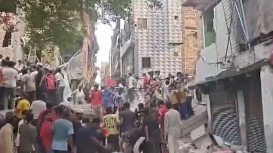 Several people feared trapped after a residential building collapsed in Delhi's Seemapuri. (Screenshot X/@PTI_News)