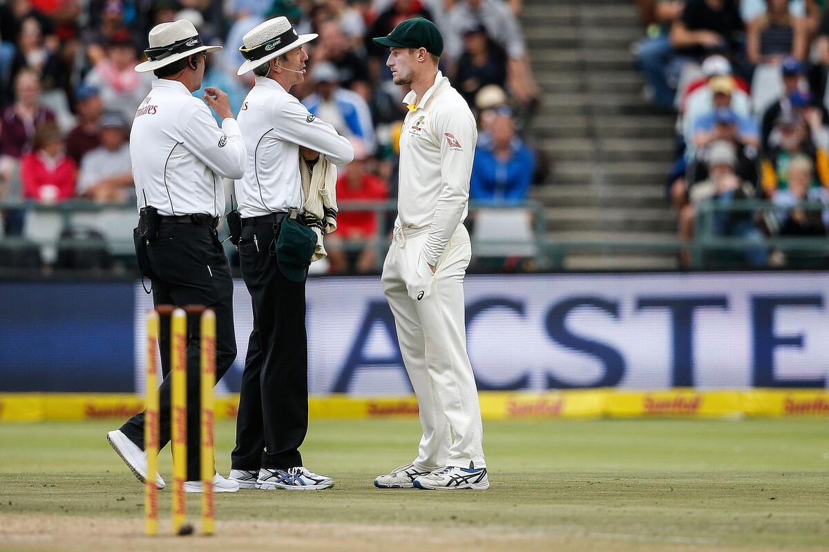 Cameron Bancroft questioned by the umpires during the Newlands Test match. (X Images) Cameron Bancroft questioned by the umpires during the Newlands Test match. (X Images)