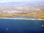 Bolsa Chica’s restored tidal basin is functioning as a nursery for fish and a stopover for Pacific Flyway birds. Its eelgrass, salt marsh and mudflats support diverse wildlife, including endangered nesting birds. The inlet’s upkeep remains costly as waves and tides carry sand into the basin.