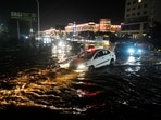 Floodwaters from the swollen Gomti reaching roads near a prominent mall near the Atal Bihari Vajpayee Ekana Cricket Stadium on Shaheed Path in Lucknow on Wednesday. (Deepak Gupta/HT Photo)