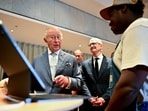 King Charles in conversation with a man who said he was laid off from Microsoft. (via REUTERS)
