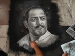  Rangoli artist Shreehari Pavale works on a rangoli portrait paying tribute to veteran actor Nana Patekar, in Vashi, Navi Mumbai.