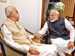 Prime Minister Narendra Modi during a meeting with veteran BJP leader and former deputy PM Lal Krishna Advani at the latter’s residence in New Delhi on Wednesday. (PTI)