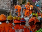 A view of NDRF, Delhi Fire Service, Civil Defence and Delhi Police personnel carrying out rescue operations after a five-storey building collapsed in the Seemapuri area of New Delhi.