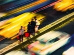 Among urban workers aged 15 and above who travelled at least 1 km to a fixed or non-fixed workplace, 52.3% used a two-wheeler as their primary mode. 