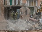 Rescuers continue to remove debris at the site of an apartment building hit by a Russian missile strike, in which at least 22 residents have been killed according to State Emergency Service, in the town of Pryluky, amid Russia's attack on Ukraine, in the Chernihiv region, Ukraine.
