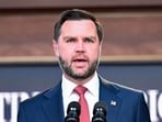 US Vice President JD Vance speaks during a press conference to provide an update in the federal investigation and crackdown regarding fraud and abuse of the H-1B visa program in Washington.