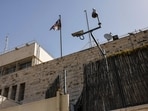 The British diplomatic flag flutters outside the British consulate in Jerusalem, after the Israeli government ordered the UK to shut down its operations. 