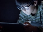 Children wearing glasses and scrolling away has become an increasingly common sight. (Pexel)