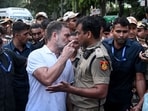 Congress MP Rahul Gandhi scuffles with a policeman during a protest by the opposition INDIA bloc in New Delhi on Wednesday.