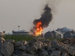 Flames burn at a facility belonging to Saudi oil giant Aramco south of Riyadh.