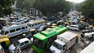 Traffic moves through Connaught Place as security was tightened ahead of the INDIA bloc protest in New Delhi. (Photo by Raj K Raj/ Hindustan Times) Traffic moves through Connaught Place as security was tightened ahead of the INDIA bloc protest in New Delhi. (Photo by Raj K Raj/ Hindustan Times)