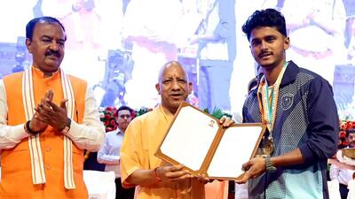 Chief minister Yogi Adityanath distributing appointment letters in Lucknow on Thursday. (HT PHOTO) Chief minister Yogi Adityanath distributing appointment letters in Lucknow on Thursday. (HT PHOTO)
