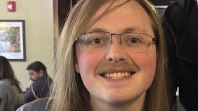 Police are searching for Ryan Hanafin, 22, after his mother Andria Hanafin was found shot dead at home.