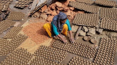 Gram it: With Navratri beginning on October 11, potters across the city are busy preparing diyas ahead of the festive season. In Gurugram, an artisan shapes clay to create earthen lamps, giving these form before these light up homes during the celebrations. This festive season, go #VocalForLocal and choose handmade diyas to support local potters and their craft. (Photo: PTI)