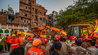 A view of NDRF, Delhi Fire Service, Civil Defence and Delhi Police personnel carrying out rescue operations after a five-storey building collapsed in the Seemapuri area of New Delhi. (Raj K Raj/ HT Photo) A view of NDRF, Delhi Fire Service, Civil Defence and Delhi Police personnel carrying out rescue operations after a five-storey building collapsed in the Seemapuri area of New Delhi. (Raj K Raj/ HT Photo)