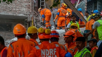 A view of NDRF, Delhi Fire Service, Civil Defence and Delhi Police personnel carrying out rescue operations after a five-storey building collapsed in the Seemapuri area of New Delhi. (Raj K Raj/ HT Photo)