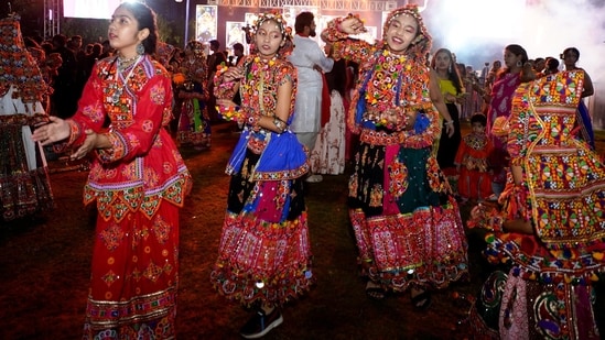 Dancers celebrate the spirit of Navratri with traditional Garba and festive cheer. This year, Navratri is from October 11 to 19 
