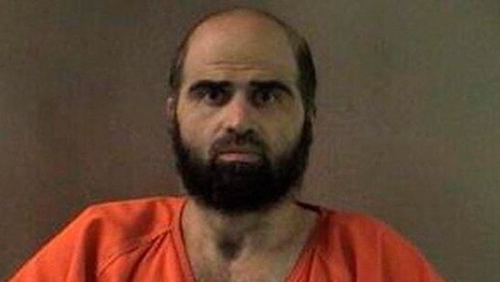 Nidal Hasan, charged with killing 13 people and wounding 31 in a November 2009 shooting spree at Fort Hood, is pictured in an undated handout photo obtained by Reuters on June 29.