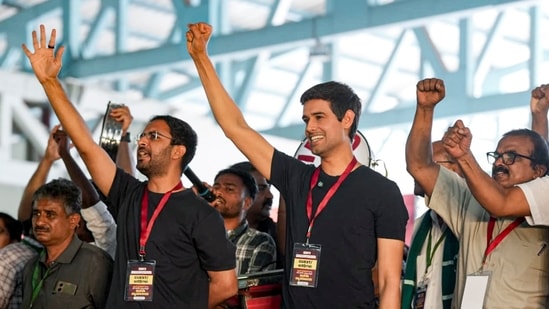 YouTuber Dhruv Rathee, centre, and others during a protest against CEC Gyanesh Kumar over the Special Intensive Revision (SIR) of electoral rolls, in Bengaluru.