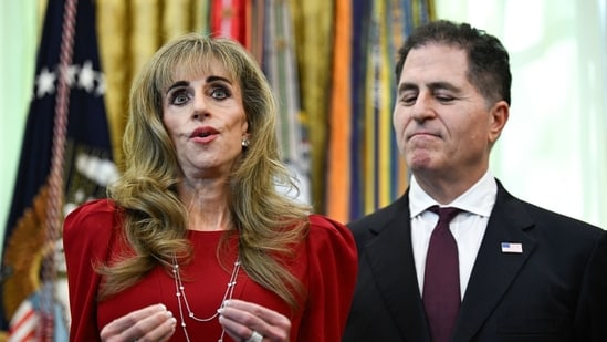 Susan Dell, wife of Michael Dell, left, and Michael Dell, chairman and chief executive officer of Dell Inc., during an announcement on Trump Accounts in the Oval Office of the White House in Washington, DC, US, on Wednesday, Oct. 7, 2026.
