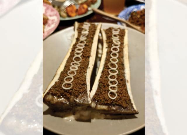 Chef Chalee Kader served his famous bone marrow. Chef Chalee Kader served his famous bone marrow.