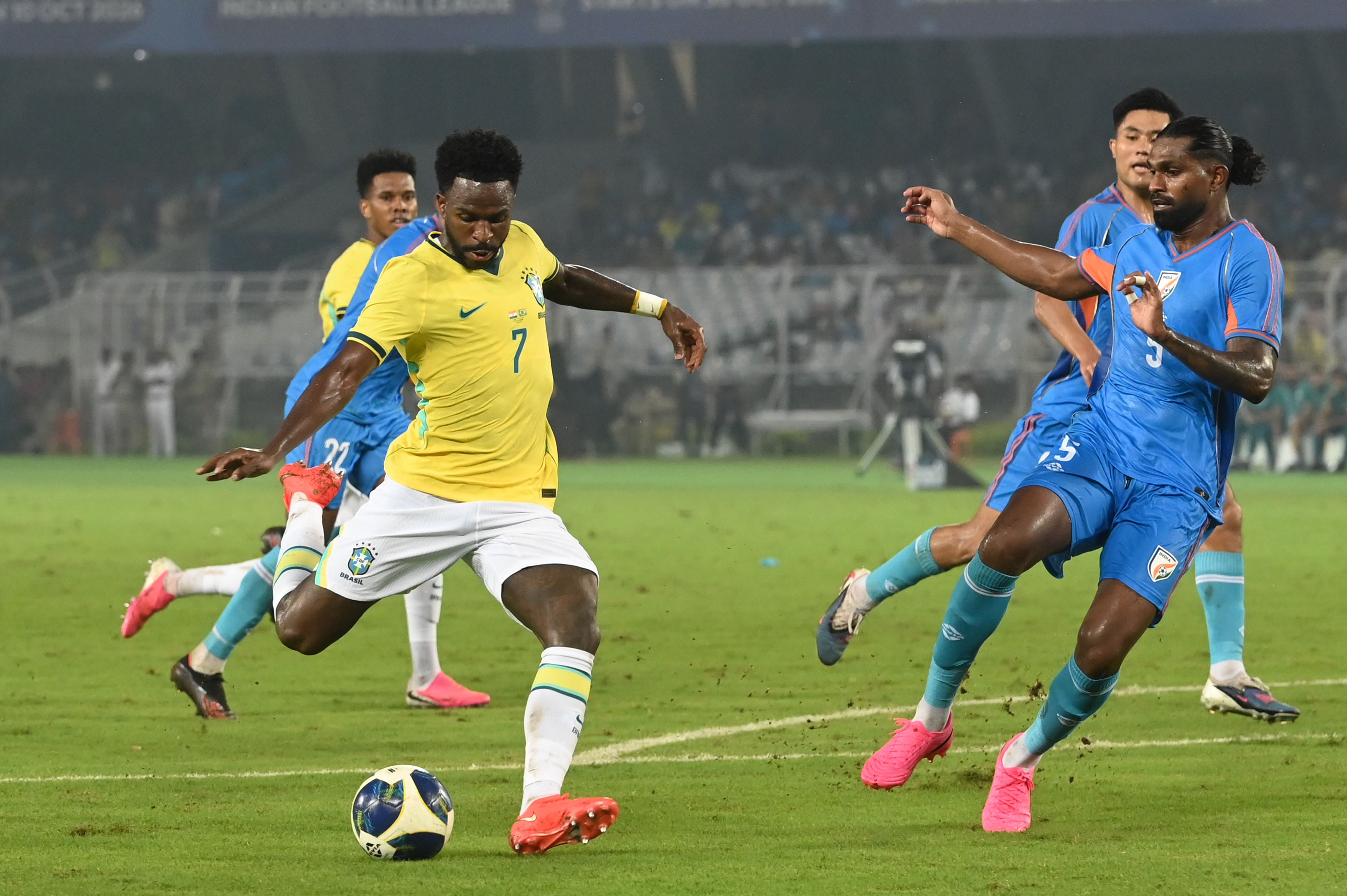 Bijoy Verghese tries to get in the way of Vinicius Jr attempting a shot in the India-Brazil friendly in Kolkata on Saturday. (Samir Jana/HT) Bijoy Verghese tries to get in the way of Vinicius Jr attempting a shot in the India-Brazil friendly in Kolkata on Saturday. (Samir Jana/HT)