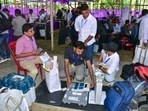 Bypoll election results LIVE: Polling officials check Electronic Voting Machines (EVMs) and other polling materials at a distribution centre before leaving for their respective polling booths, in Nagaon, Assam.