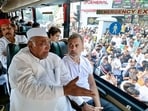 Congress president Mallikarjun Kharge and Lok Sabha LoP Rahul Gandhi sit inside a bus while travelling to Raj Ghat to protest against Chief Election Commissioner Gyanesh Kumar.