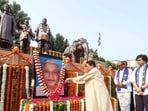 Bahujan Samaj Party president Mayawati paying floral tribute to party founder Kanshi Ram’s portrait on his death anniversary in Lucknow on Friday. (Deepak Gupta/HT Photo)