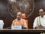 Chief minister Yogi Adityanath addresses a press conference alongside deputy chief ministers Keshav Prasad Maurya and Brajesh Pathak following a state cabinet meeting at Lok Bhawan, in Lucknow on Friday. (PTI Photo) Chief minister Yogi Adityanath addresses a press conference alongside deputy chief ministers Keshav Prasad Maurya and Brajesh Pathak following a state cabinet meeting at Lok Bhawan, in Lucknow on Friday. (PTI Photo)