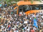 Congress and INDIA bloc supporters as INDIA bloc MPs, including Leader of the Opposition in the Lok Sabha Rahul Gandhi and Leader of the Opposition in the Rajya Sabha Mallikarjun Kharge, board a bus in Connaught Place before heading towards Rajghat to stage a protest in New Delhi on Thursday. 