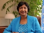 (FILES) New United Nations High Commissioner for Human Rights, South African judge Navanethem (Navi) Pillay poses in her office at the Palais Wilson, headquarters of the specialised UN agency as she takes up her post on Spetember 1, 2008 in Geneva. The Nobel Peace Prize was on October 9, 2026, awarded to South Africa's Navi Pillay, a human rights champion who headed the Rwanda genocide tribunal and last year accused Israel of genocide in Gaza, the prize committee said. (Photo by Fabrice COFFRINI / AFP)