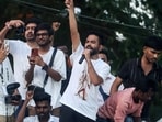 Abhijeet Dipke, head of the Cockroach Janta Party (CJP), speaks during a protest demanding the resignation of Chief Election Commissioner Gyanesh Kumar, at Shivaji Park in Mumbai.